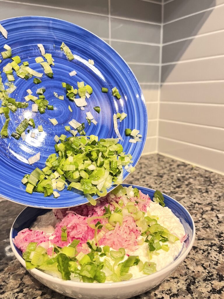 adding scallions to Polish Farmer’s Cheese Spread