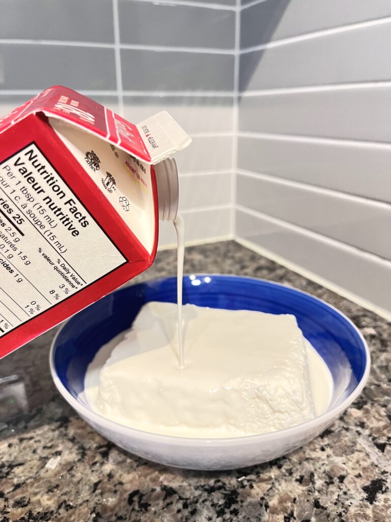 stirring cream for Polish Farmer’s Cheese Spread