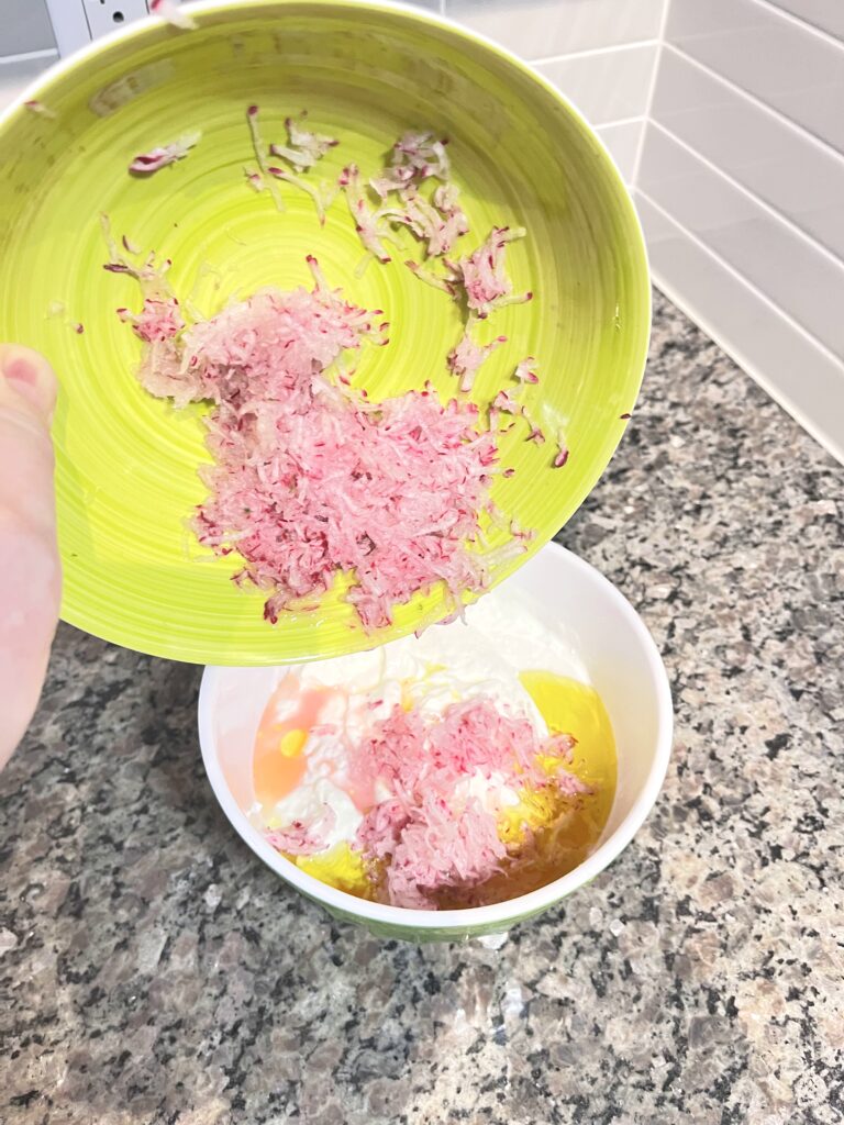 adding radish to Radish Tzatziki Dip
