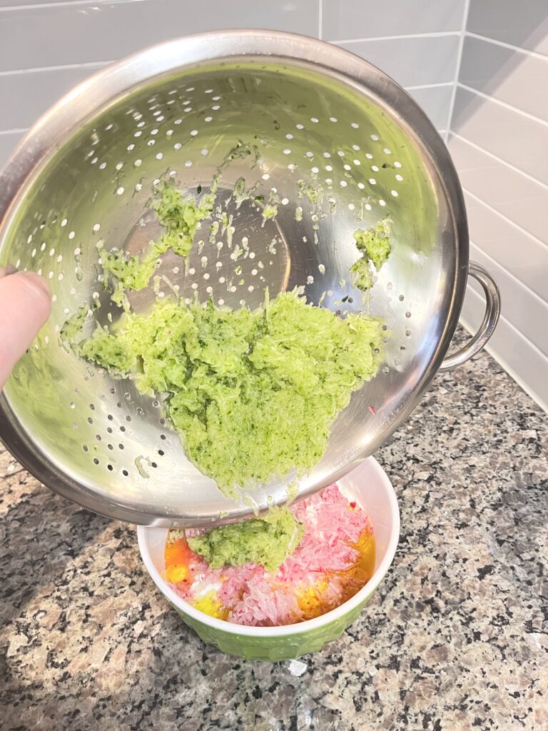 adding cucumber to Radish Tzatziki Dip